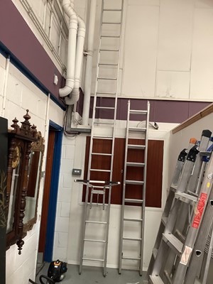 Lot 364 - Abru Starmaster DIY 2.5 meter ladder approximately extending too 4.47 meters together with a large industrial ladder and a ladder stand off. Ladder measuring approximately 4.5 meters