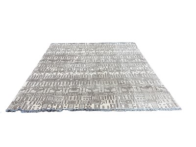 Lot 1416 - OKA at home with design wool rug with geometric decoration, 244cm x 305cm