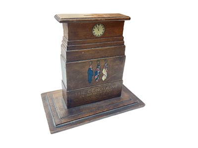 Lot 722 - First World War interest- wooden money box in the form of The Cenotaph, with applied decals and captioned 'The Cenotaph in memory of our glorious dead', 15.5cm in overall height.