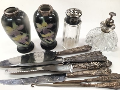 Lot 1083 - Pair of silver mounted ceramic vases, silver topped glass sugar castor and perfume bottle, together with a group of silver handled flatware etc