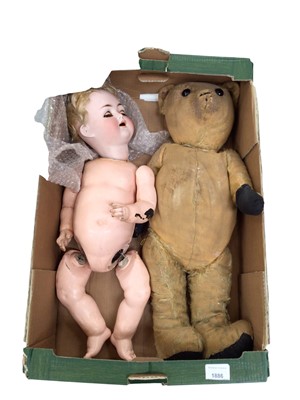 Lot 1886 - Doll bisque head marked P M 23 Germany 10, short blonde hair, blue sleeping eyes, painted brows and open mouth, dimple in chin. Composite body and limbs.  Plus an early much loved teddy bear.