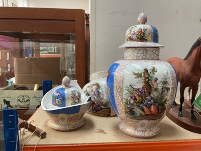 Lot 635 - Large pair of Dresden porcelain covered vases, painted with figural scenes on a blue and gilt ground, 'Augustus Rex' marks, 36.5cm high (one a/f/)