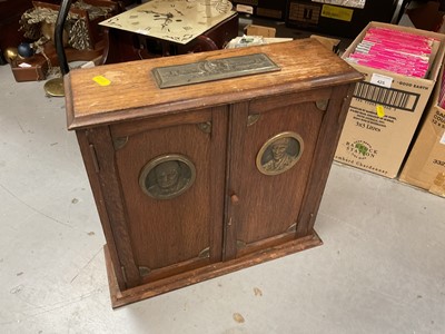 Lot 426 - Oak Second World War commorative smokers cabinet with plaques depicting Churchill and Montgomery