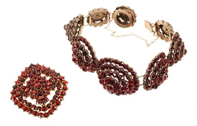 Lot 519 - 19th century Bohemian garnet cluster bracelet and pendant/brooch (2)