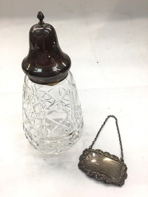 Lot 1095 - Silver topped cut glass sugar castor and a silver spirit label with presentation engraving