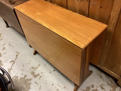 Lot 1323 - 1970's teak G-Plan drop leaf table, together with a set of four dining chairs