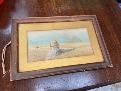 Lot 449 - Egyptian interest- early 20th watercolour study of the Spinx, monogrammed NL, mounted in glazed frame, image 20 x 10cm, with label verso.