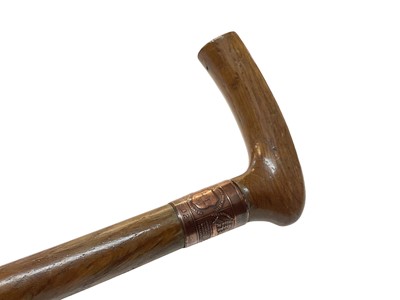 Lot 728 - Edwardian walking stick engraved H. L. and dated 1902, constructed from oak and copper from Nelson's flagship HMS Foudroyant, 89.5cm in length.