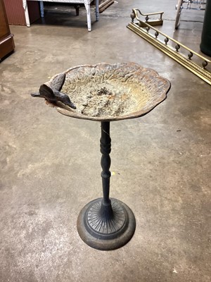 Lot 1480 - Small iron bird bath, 51cm high. And an iron trough. (2)