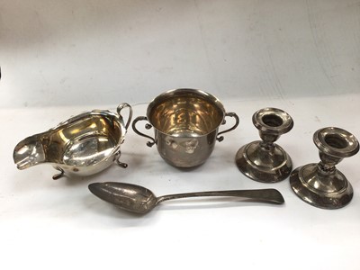 Lot 1109 - Silver two handled sugar bowl, silver gravy boat, pair of small silver candlesticks and a Georgian silver tablespoon