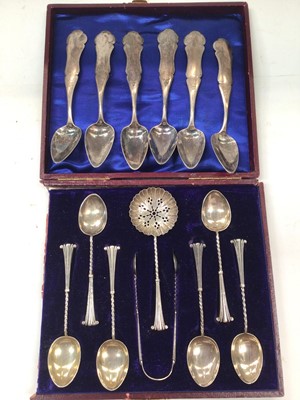 Lot 1113 - Cased set of six silver teaspoons, pair of sugar tongs and a sifting spoon, together with a set of six Continental silver (possibly French) teaspoons