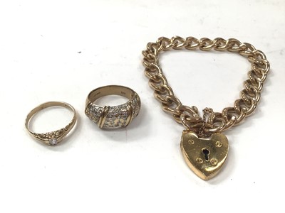 Lot 1119 - Two 9ct gold dress rings and a gold plated bracelet with padlock clasp