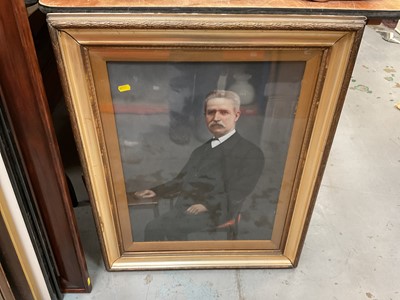 Lot 523 - Early 20th century overpainted portrait photograph of a man in glazed gilt frame.