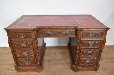 Lot 1236 - 19th century heavily carved pedestal desk