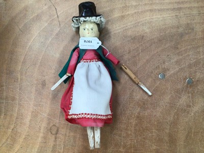 Lot 1978 - 19th century articulated wooden peg doll in Welsh costume