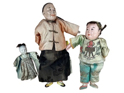 Lot 1977 - Three Chinese dolls