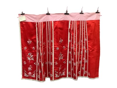 Lot 2126 - Chinese red Wedding skirt with embroidered flowers and cotton waist band.