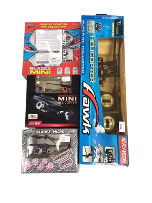 Lot 1889 - Four remote control helicopters in original boxes plus a Classic Train set boxed.