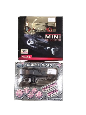 Lot 1889 - Four remote control helicopters in original boxes plus a Classic Train set boxed.