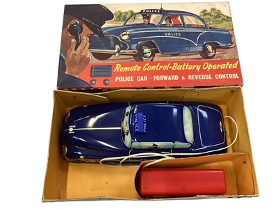 Lot 1910 - Remote controlled Police Car by Welsotoys boxed, Rolls Royce Clifford Series and Mettoy Big Poly Fire Engine and Silver Tone plastic trumpet, all boxed.