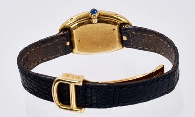 Lot 601 - Ladies Cartier 18ct gold 'Baignoire' wristwatch on black leather strap