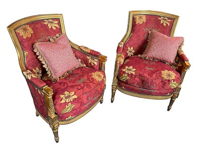 Lot 1294 - Pair of Louis XVI style carved gilt tub chairs, with fluted and boss ornament on tapered legs