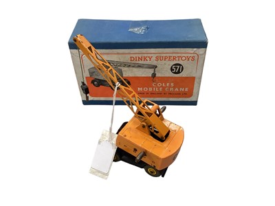 Lot 1771 - Diecast Dinky Supertoys Coles Mobile Crane no. 571, 20 - Ton Lorry - Mounted Crane no. 972, Elevator loader no. 962 x2 (all boxed) and other model vehicles unboxed.