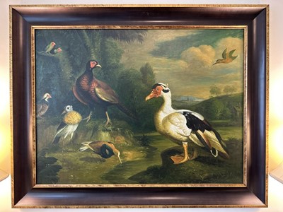 Lot 1001 - Manner of Hondecoeter, oil on canvas - Landscape with Muscovy Duck, Pheasant and other Exotic Birds, 75cm x 100cm, in gilt and ebonised frame