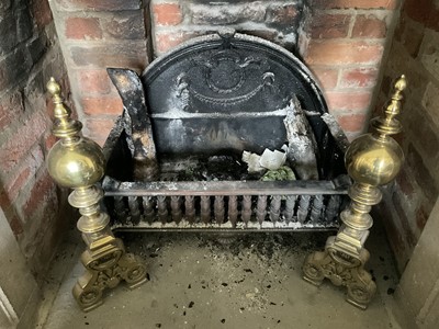 Lot 1183 - Cast iron fire basket with arched back plate, 60cm