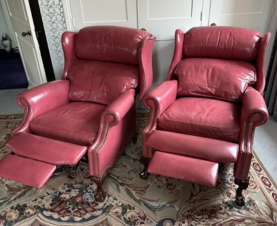 Lot 1195 - Pair of Georgian style plum coloured leather wing back recliner armchairs