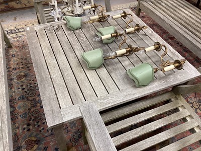 Lot 1223 - Suite of teak garden furniture comprising a pair of low wooden benches and en-suite chairs with square coffee table (5), with removable cushions