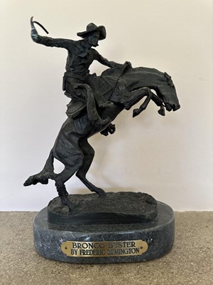 Lot 846 - After Frederick Sackrider Remington - bronze figure of 'Bronco Buster' on titled marble plinth, 16cm wide