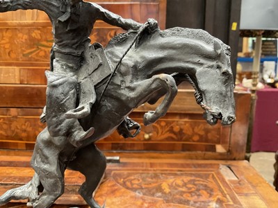 Lot 846 - After Frederick Sackrider Remington - bronze figure of 'Bronco Buster' on titled marble plinth, 16cm wide