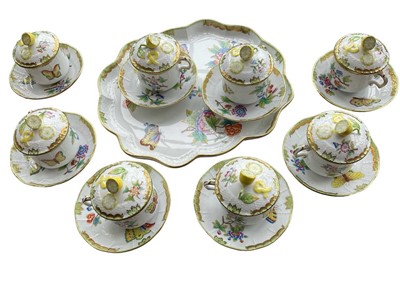 Lot 331 - Set of Herend chocolate pots and covers for eight, each on saucer, housed on shaped tray, printed marks. (25 pieces)