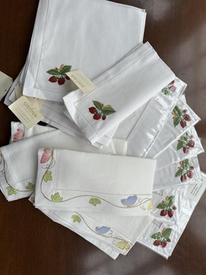 Lot 348 - Eight Sibona Textiles hand embroided pure cotton placemats and matching napkins decorated with berries (new) and six hand painted napkins with butterfly and vine borders (22)