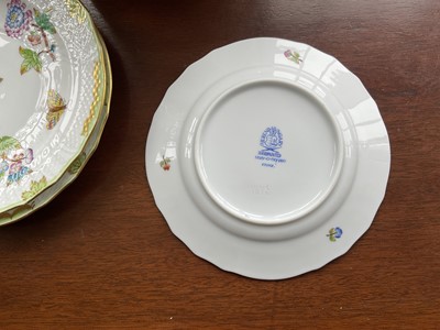 Lot 338 - Set of fourteen Herend Queen Victoria pattern dinner saucer dishes, 16cm diameter, a mixture of English and American pattern variants, together with two others slightly larger