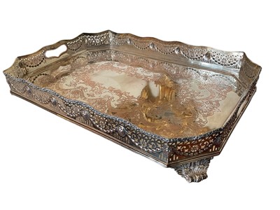 Lot 373 - 19th century Old Sheffield Plate tray with wavy pierced and lion boss gallery raise on scrolled acanthus brackets, 63cm wide