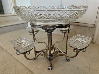 Lot 375 - Regency Old Sheffield plate and cut glass épergne, raised on lion paw feet, 35cm wide