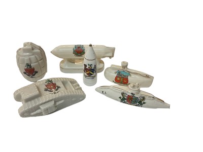 Lot 750 - Group of six Arcadian and other First World War crested ware items including grenade, tank and shell (6).