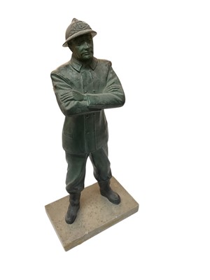 Lot 752 - Bronzed metal figure of a First World War French soldier, standing in uniform, raised on marble plinth base, 33cm in height