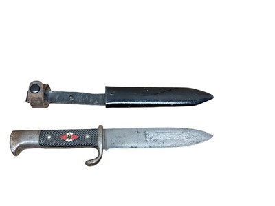 Lot 956 - Nazi Hitler Youth dagger by E & F Hopster, Solingen in black enamelled steel scabbard with integral leather frog