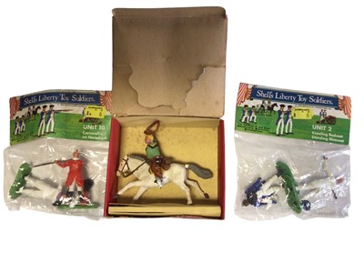 Lot 1925 - Britains Herald Swoppet Cowboys & Indians, in trade boxes, Britains Deetail Cowboys, Shell's Liberty American War of Independence and Lone Star Cowboys & Indians (1 box)