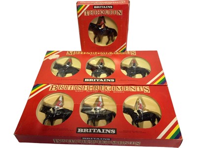 Lot 1930 - Britains Hand Painted Mounted Her Majesty the Queen No.7232, Horse Guards No.7229 & Life Guards No.7228, all boxed, plus Trade Card Sleeve with two No.7204 (x2) & No.7206 empty boxes (4 items)