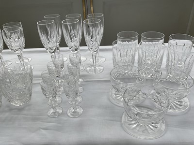 Lot 321 - Set of Waterford crystal 'Kildare' pattern glassware, comprising six champagne flutes, eight wine glasses, eight sherry glasses, eight tumblers, eight double old-fashioned glasses, three dessert bo...