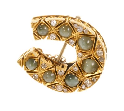 Lot 507 - Victorian chrysoberyl cats eye and diamond horseshoe brooch