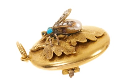 Lot 508 - Victorian gold diamond pearl and turquoise locket with flying insect and textured gold oak leaves