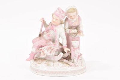 Lot 288 - German porcelain group of two children