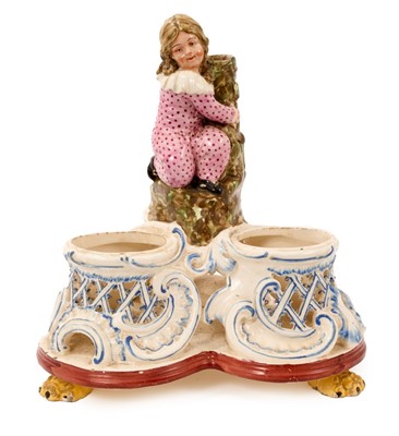 Lot 6 - Pearlware three bottle decanter stand, with figure handle, circa 1820