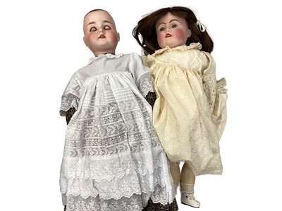 Lot 1961 - A collection of antique, modern dolls  and some teddies plus a box containing 18 Porcelain Dolls of the World.