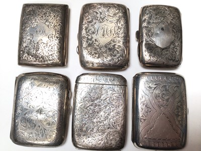 Lot 245 - Six Victorian and later silver cigarette cases, all with engraved foliate scroll decoration